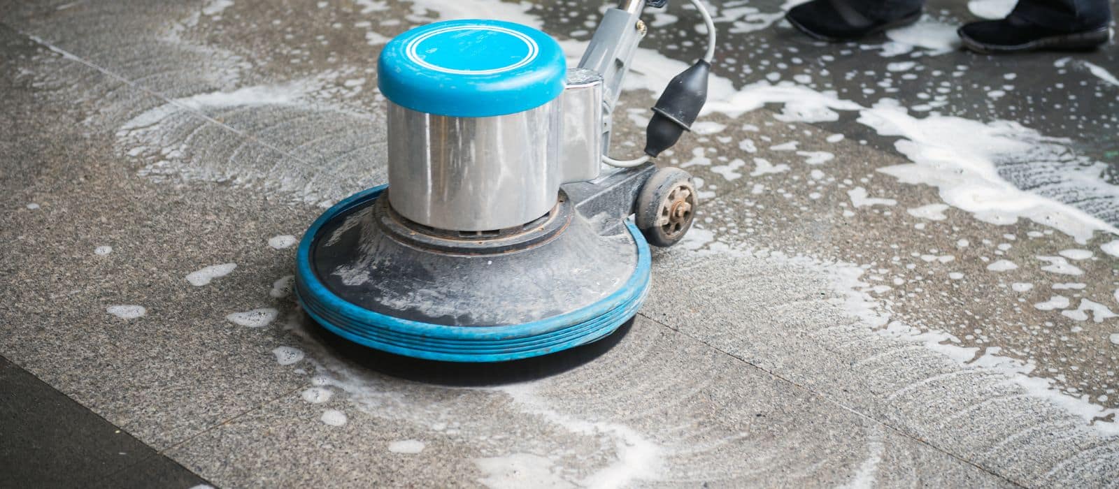 Floor cleaning machine with soap in action