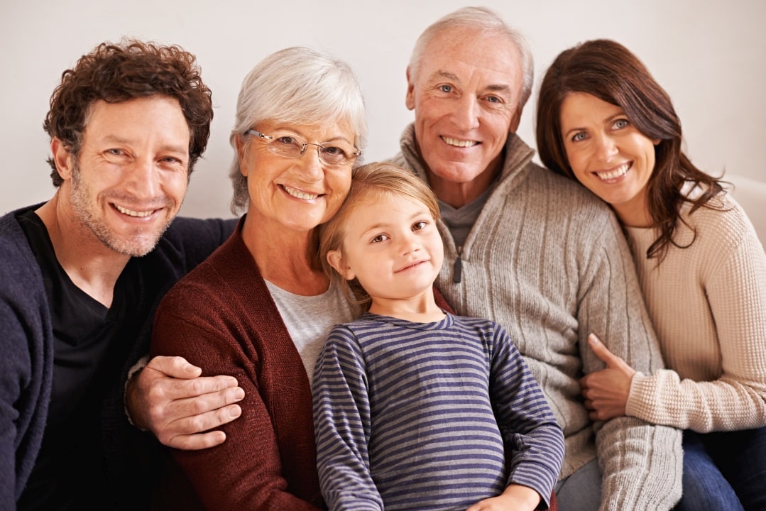 Family smiling together, highlighting mold exposure health risks